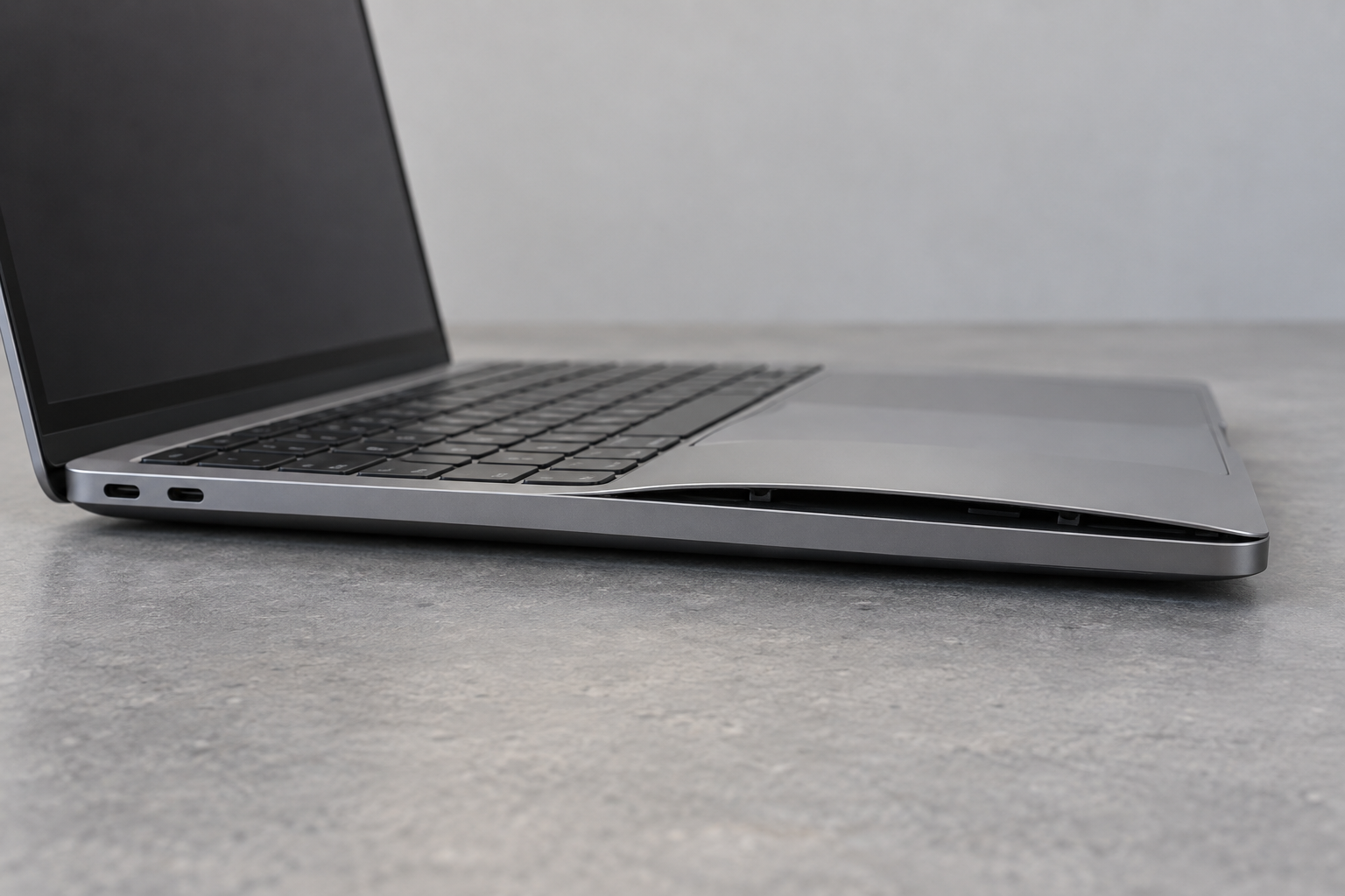 AI illustration of a powered-off laptop with a lifted palm-rest panel