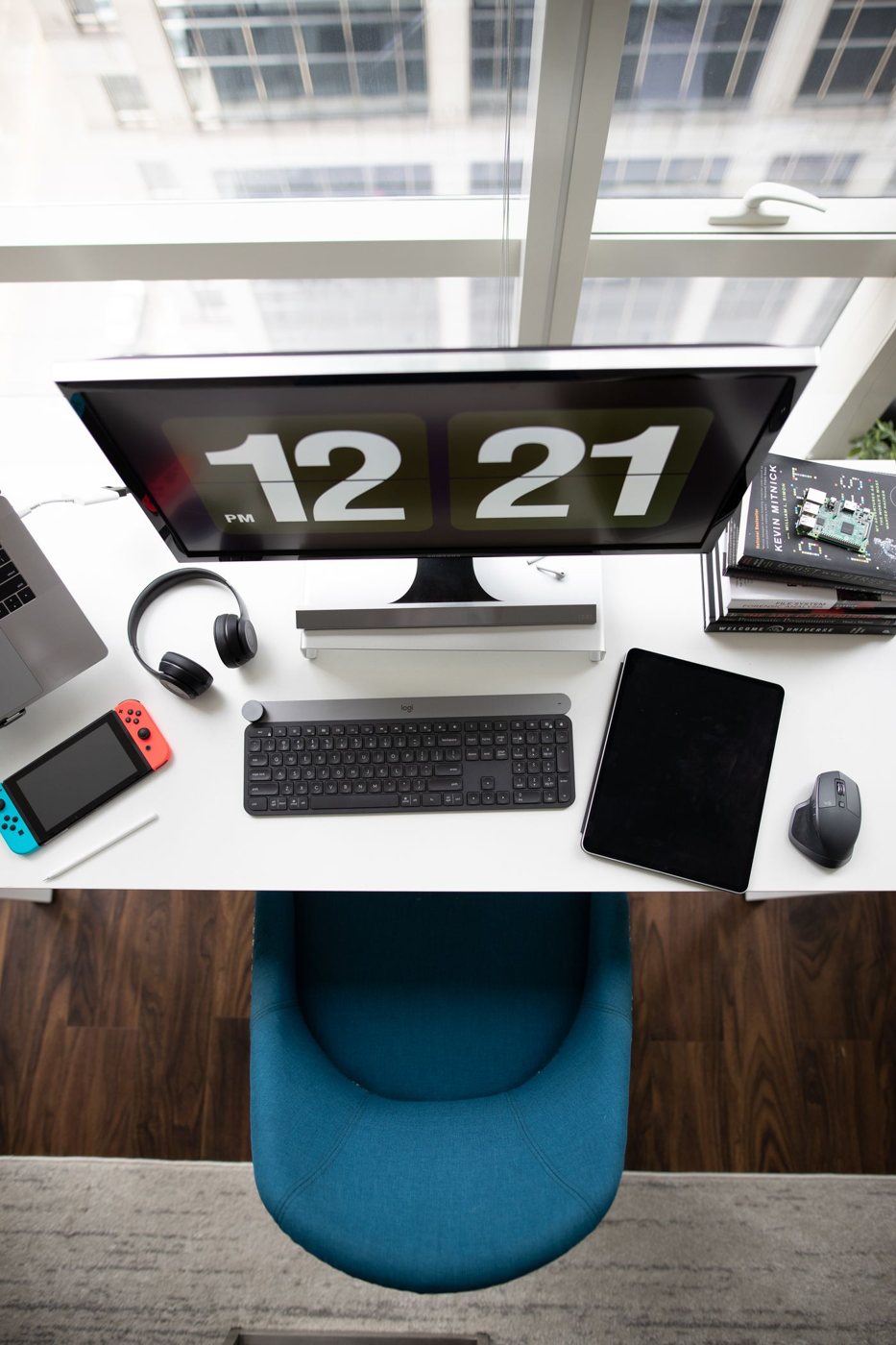 Top view of a desk with computer and writing space