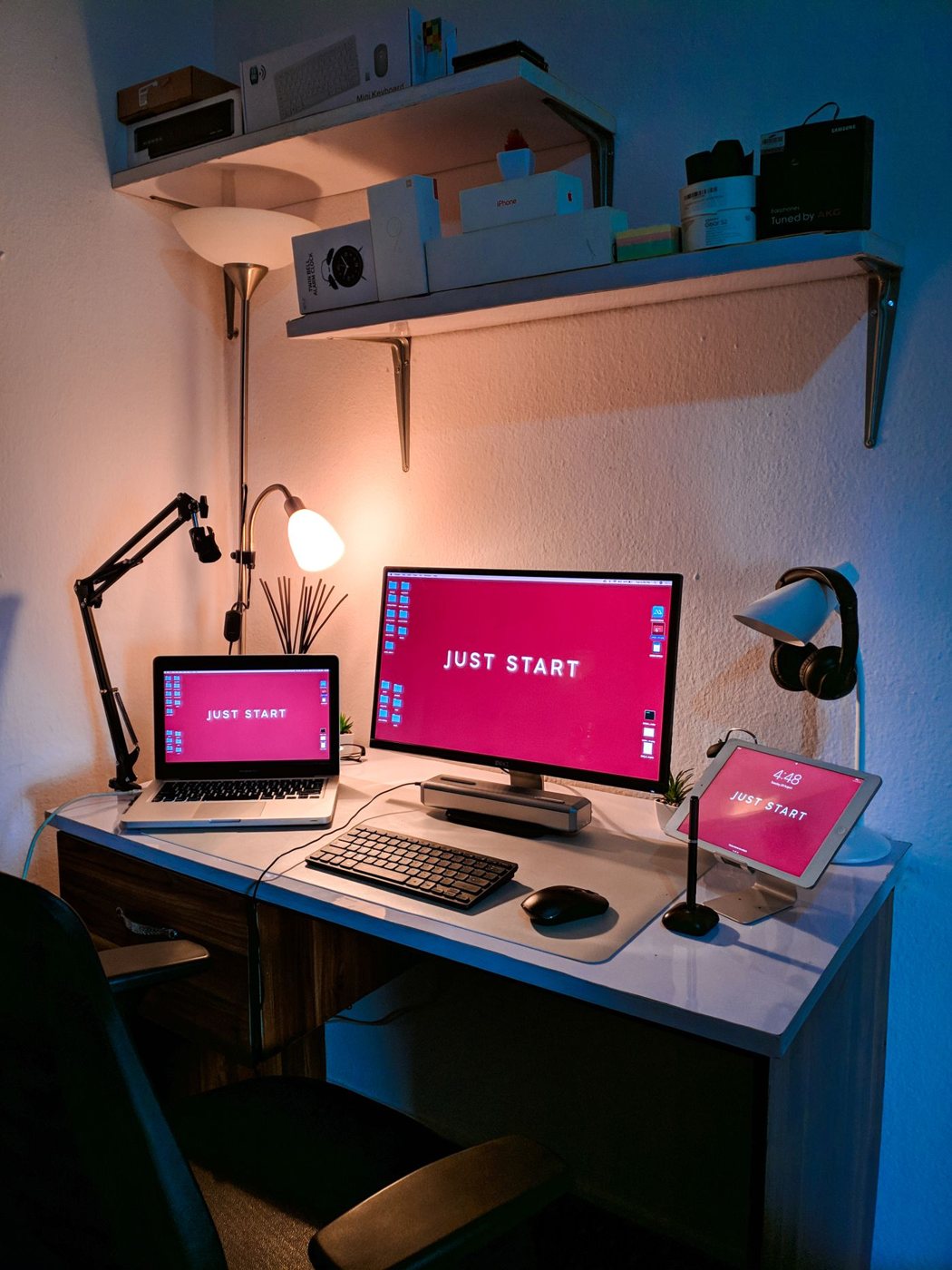 Laptop and desktop monitor together on a work desk