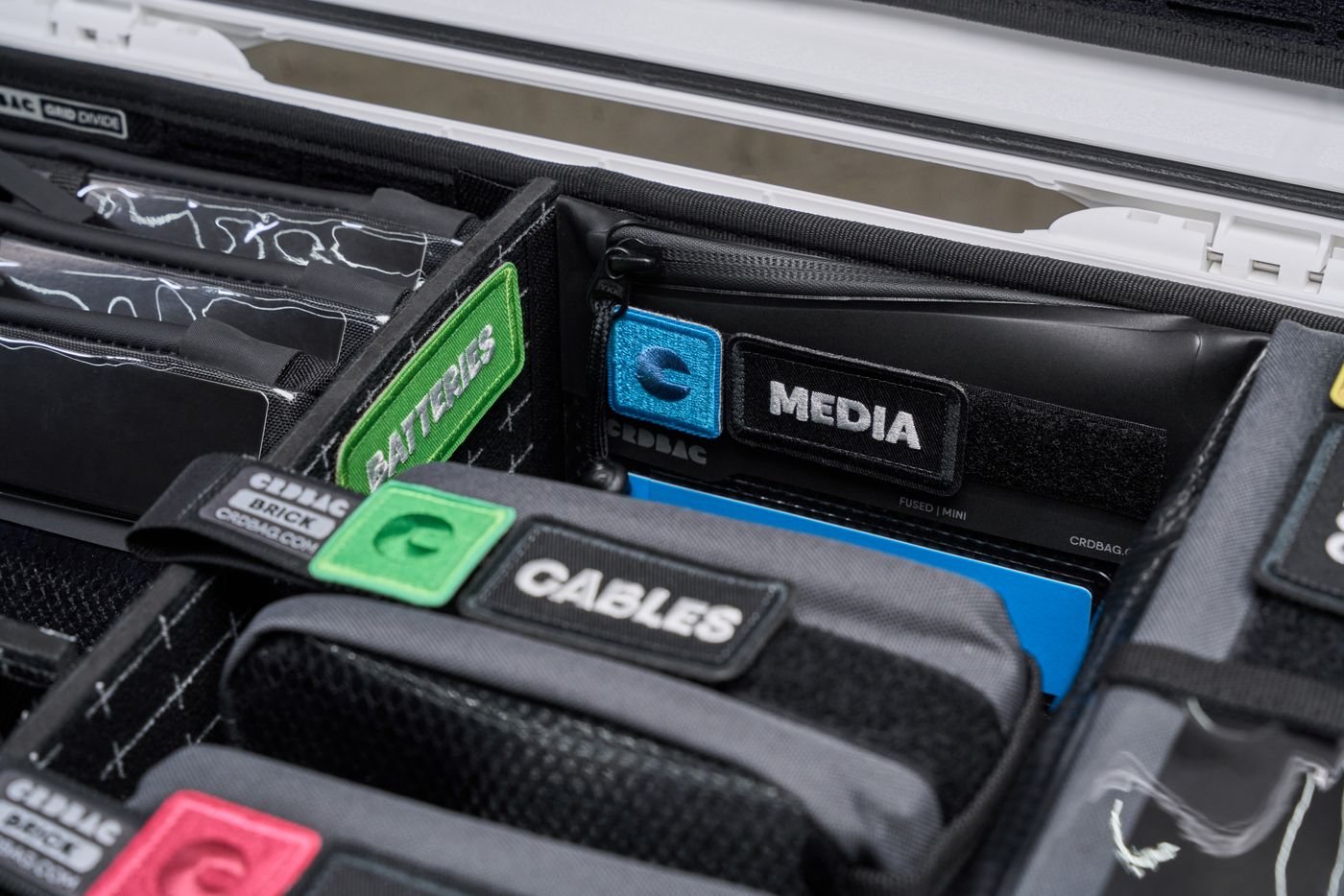 Electronic equipment organized in a padded storage case
