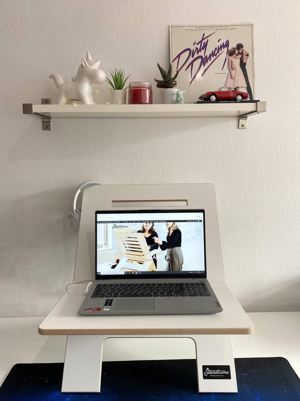 Laptop workstation with a shelf above the desk