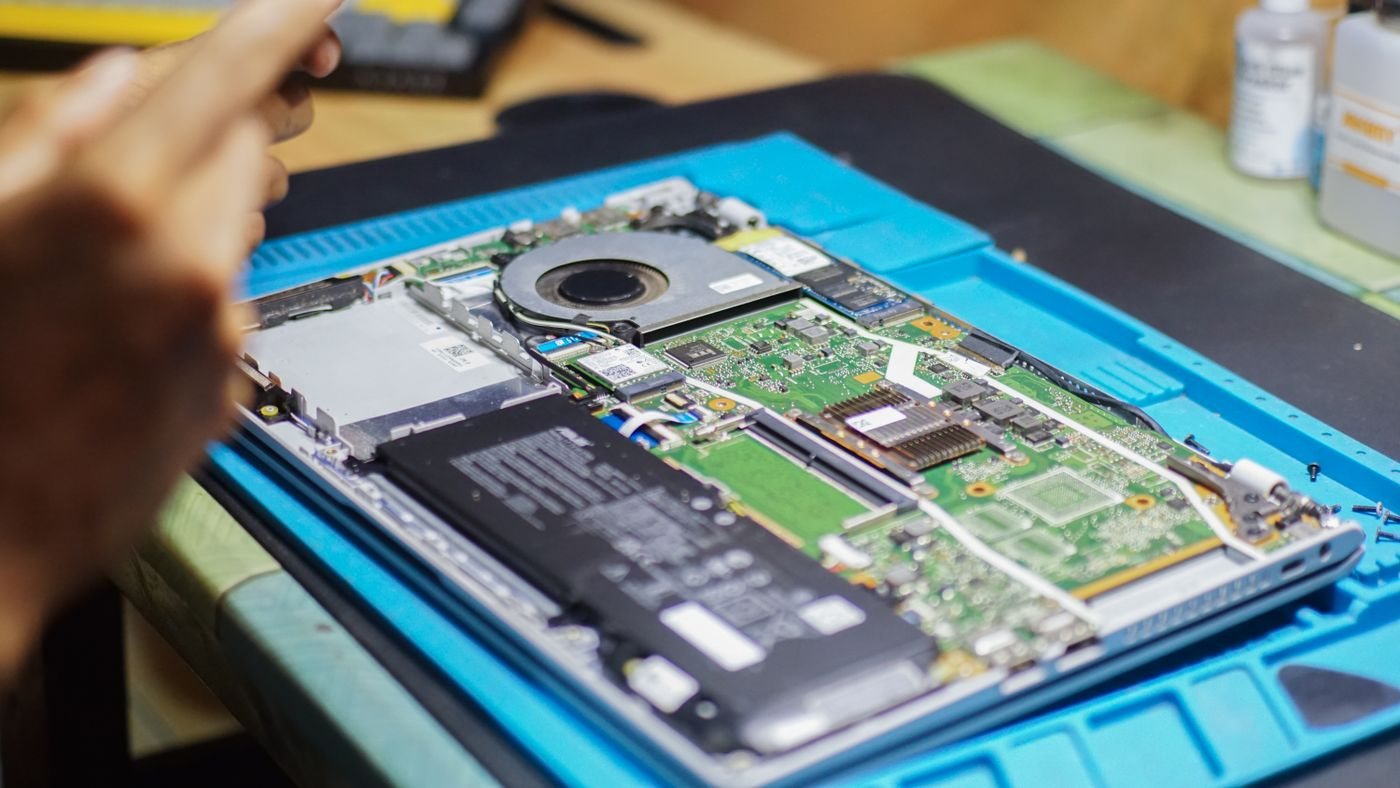 Open laptop with cooling and internal components