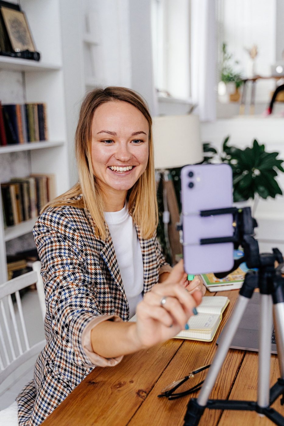 Person on a video call in a bright home office
