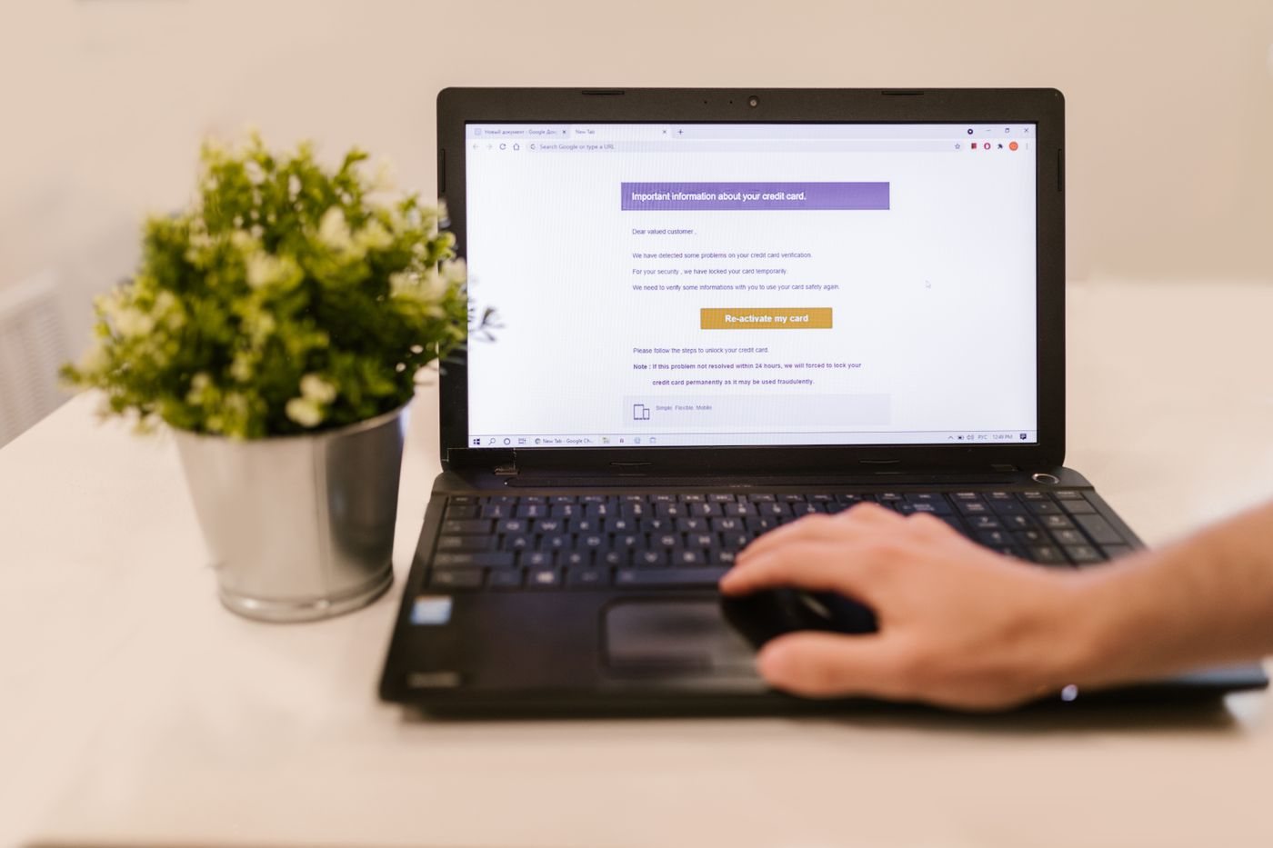 Person reviewing messages on a laptop