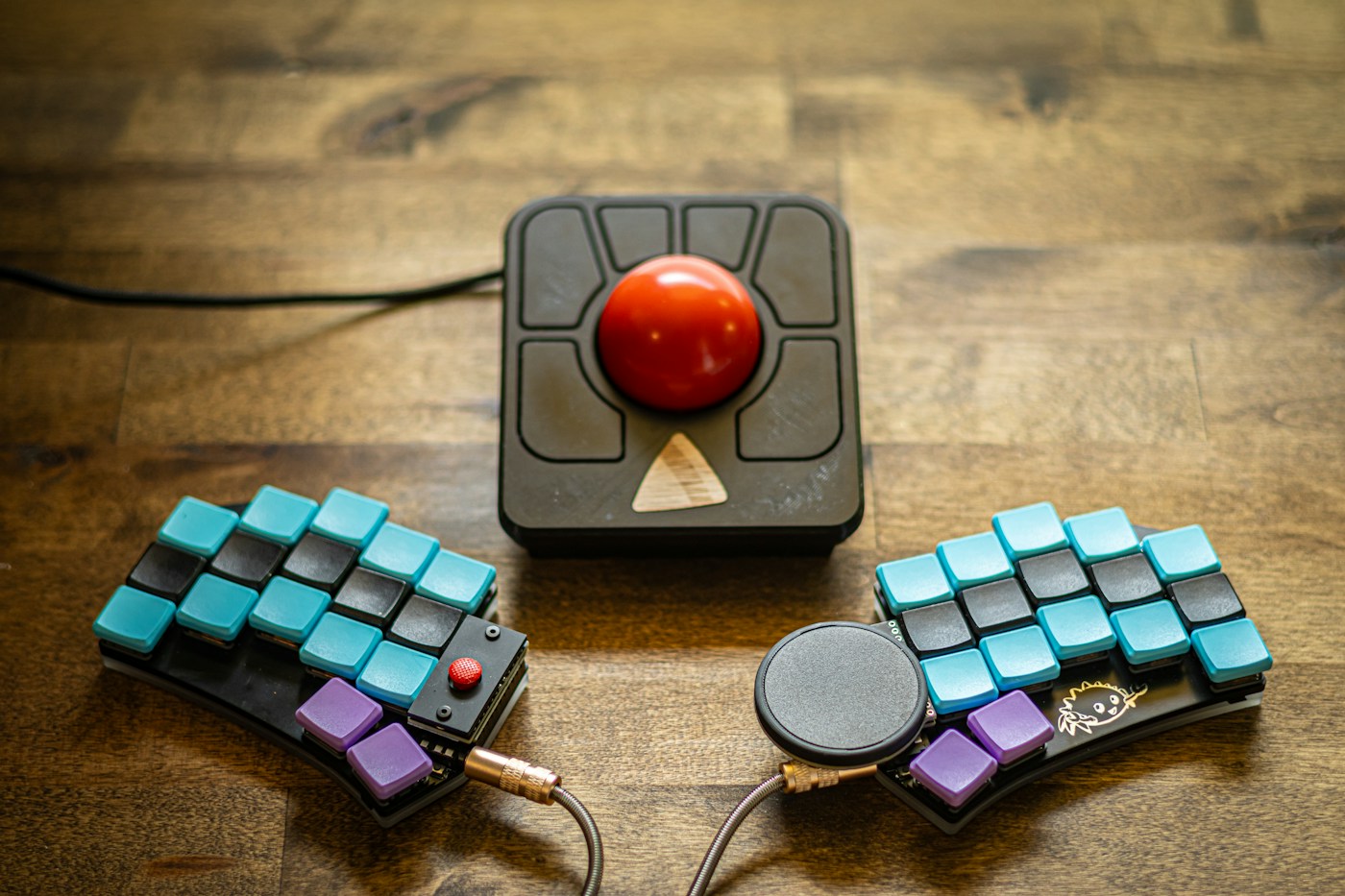 Trackball beside a split keyboard