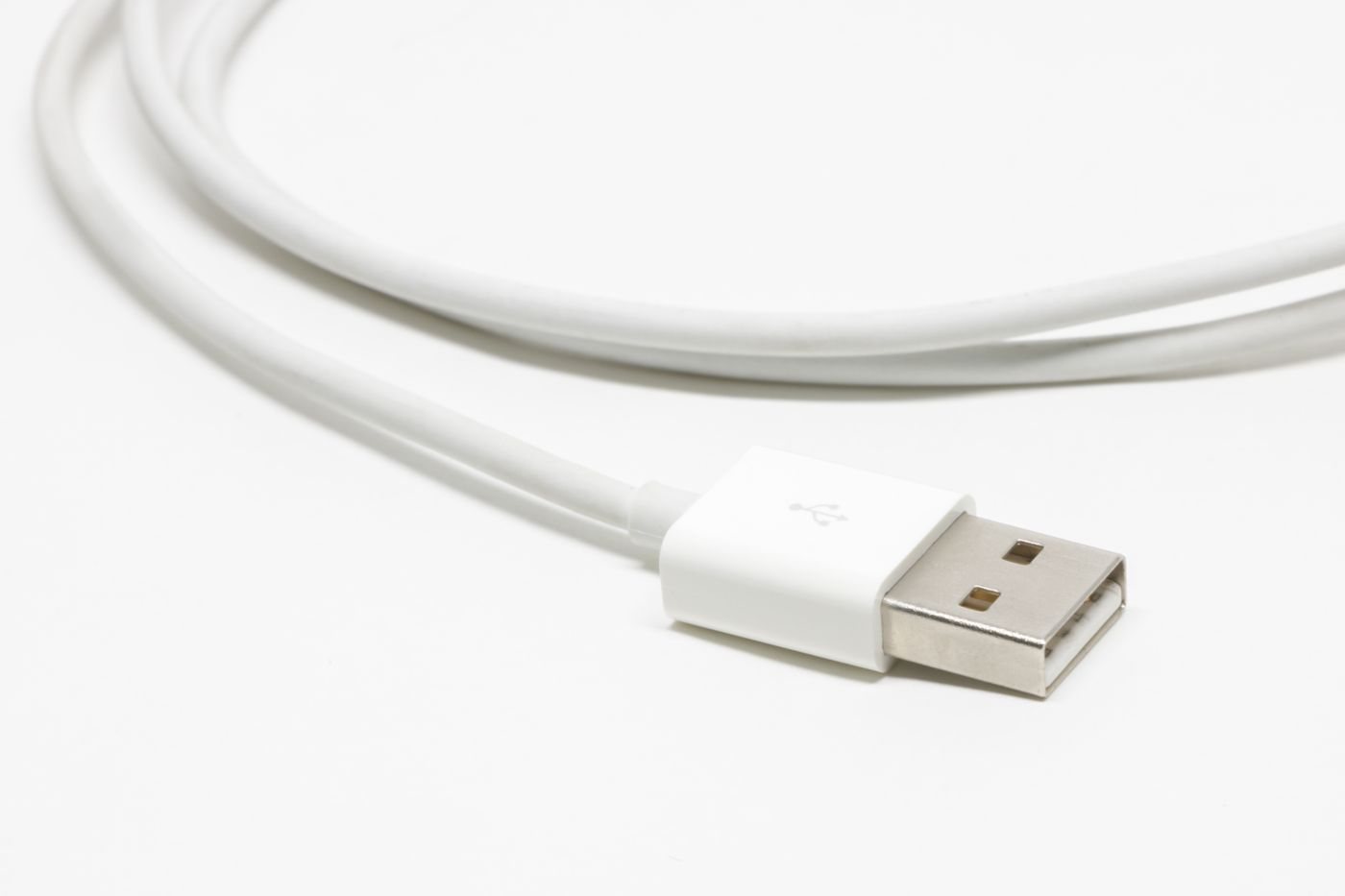 White USB connector shown close up