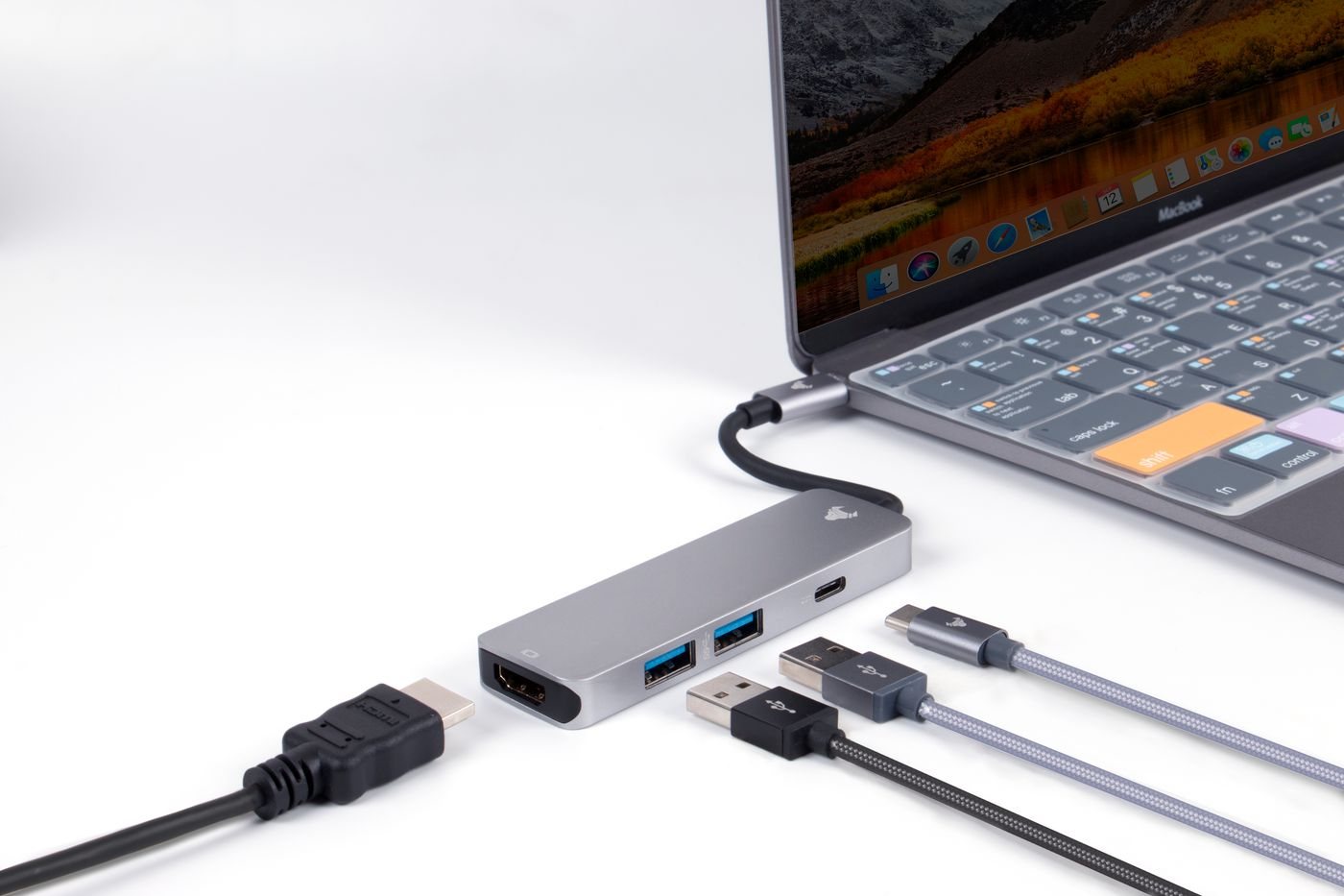 USB hub and laptop connection shown close up