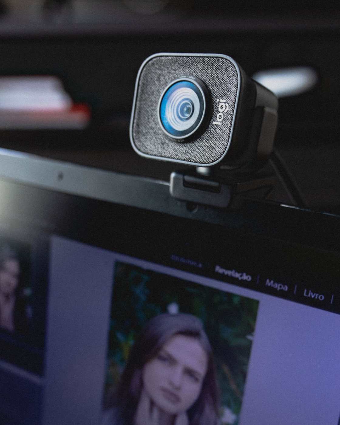 Webcam mounted on the top of a laptop screen