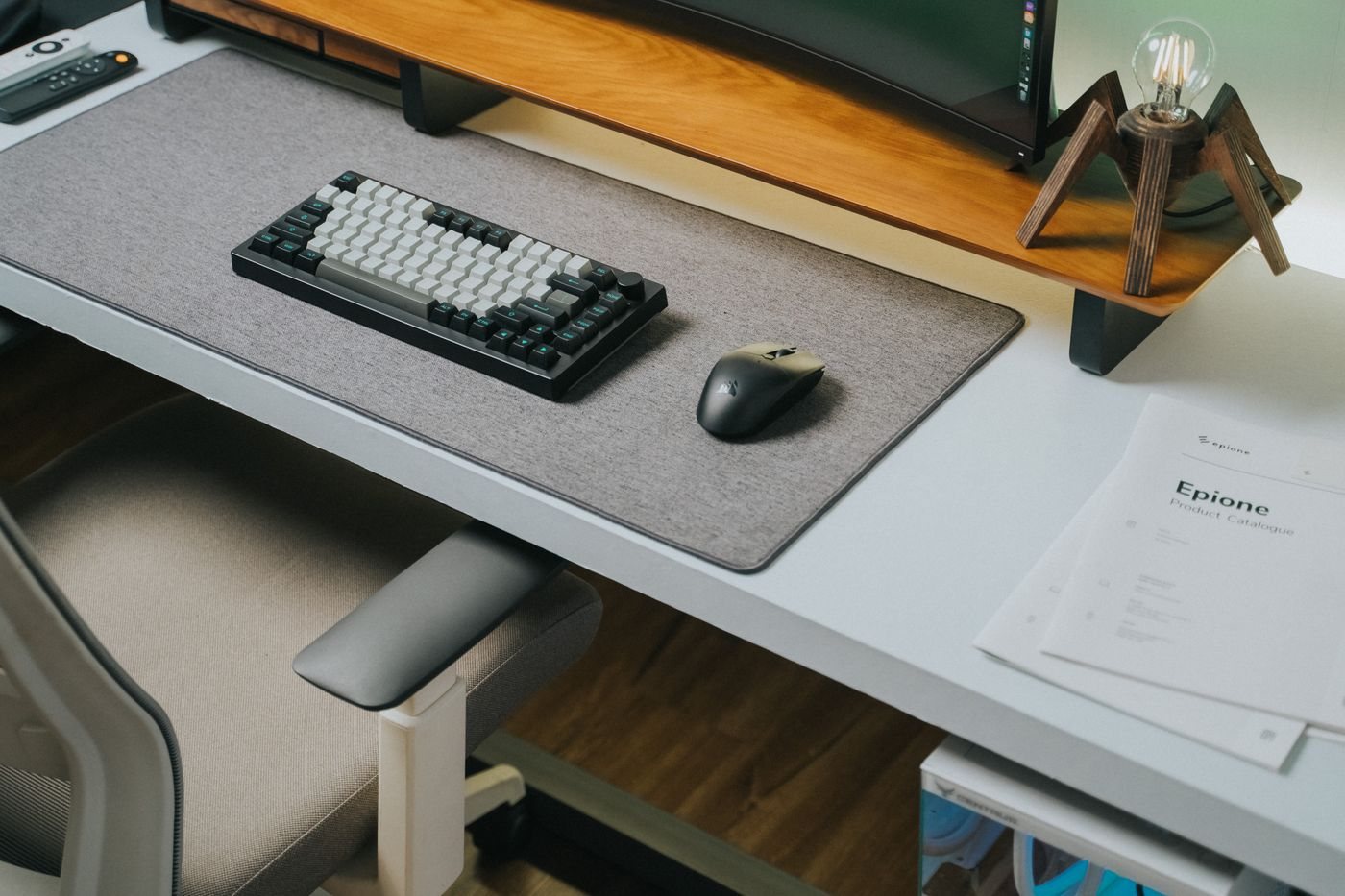 Wireless keyboard and mouse on a wooden desktop